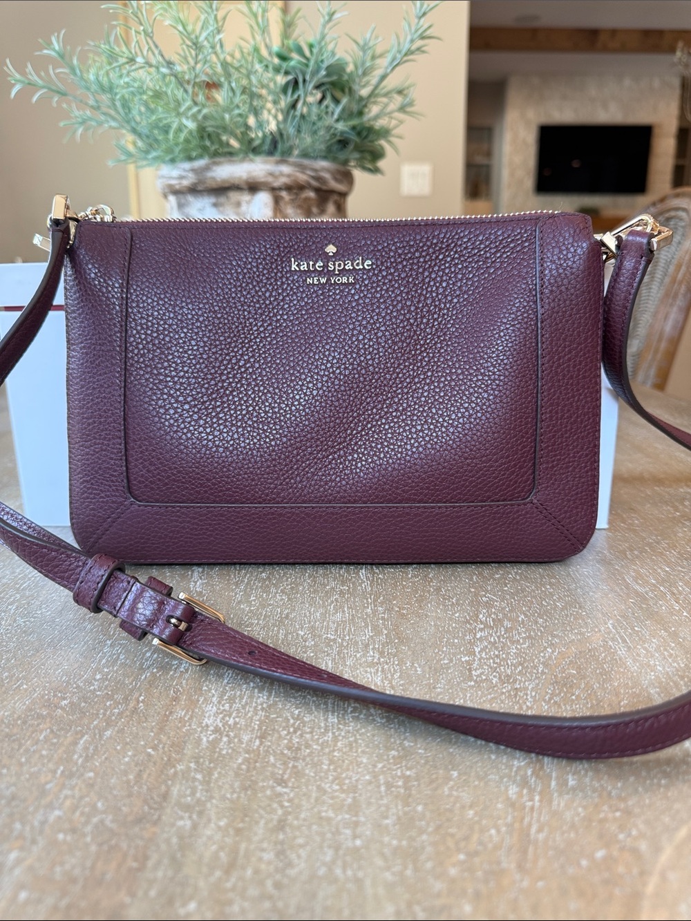kate spade pebbled leather crossbody in deep burgundy